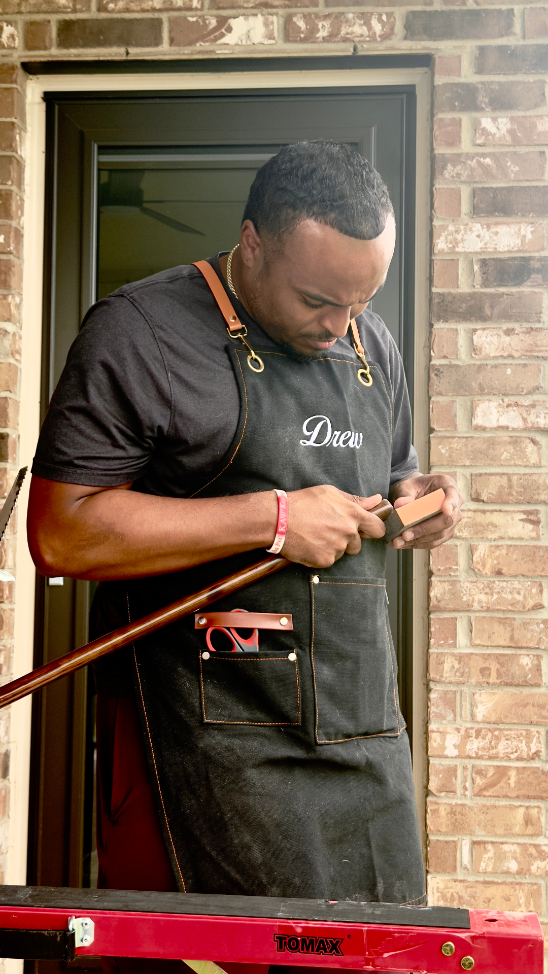 Craftsman hand-wrapping a cane